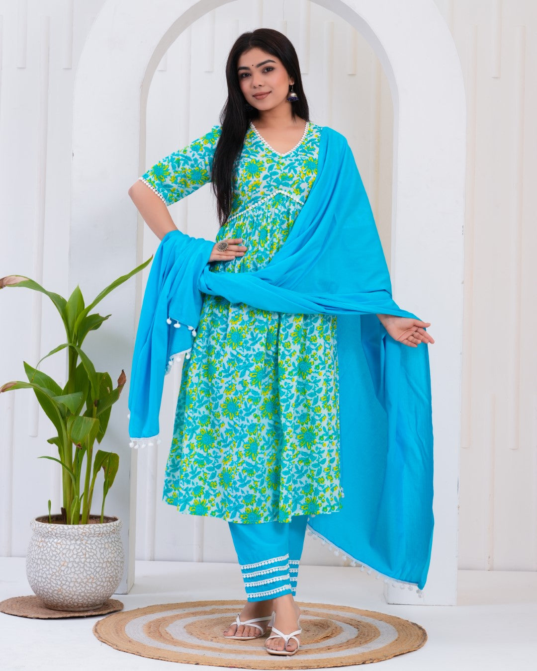 Blue Printed Kurta and Palazzos set with Dupatta.